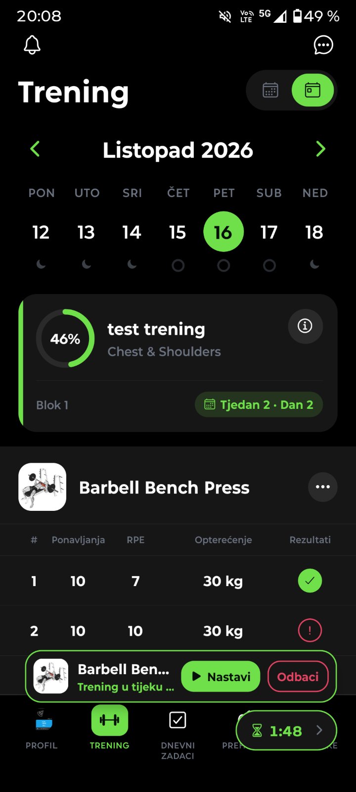 A hand holding a phone with the UrGymCoach client app
